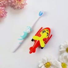 childrenâ€™s toothbrush and helicopter set