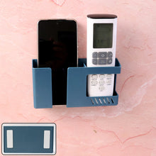 Wall Mounted Storage Holder â€“ Mobile and Remote Control Organizer (1 Pc)